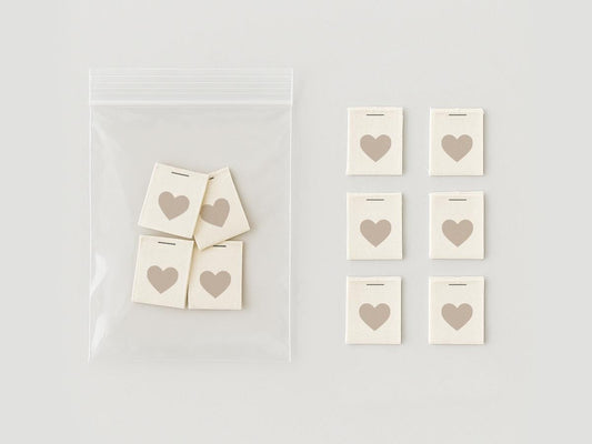 Beige Heart Sew-On Labels – 3/5"x1 5/8" (1.5x4 cm) Folded Natural Cotton Tags for Eco-Friendly Packaging, Linen Goods & Handmade Creations