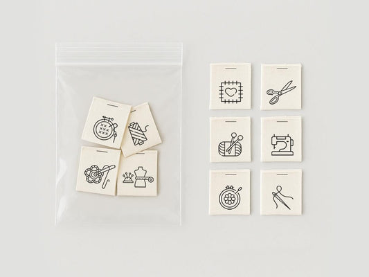 Craft Sewing Labels – 20 pcs Folded Cotton Tags with Knitting, Crochet, Embroidery, Stitch, Quilting & Sewing Icons for DIY Garment Projects